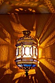Lit Lantern, inside, Seville, Andalusia, Spain