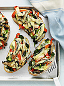 Bread with grilled vegetables. Vegetarian Pizza Bakes _ Broccoli, Mushroom, Red Peppers, Potatoes