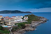 France, Corsica, Haute-Corse Department, La Balagne Region, Calvi, Punta San Francisco point, elevated view of coast hotels
