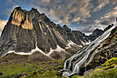 Flowing glacial creek with Mount Harrison Smith in background, Cirque of Unclimbables, Nahanni National Park, Northwest Territories