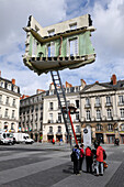 'France, Pays de la Loire, Nantes, Place du Bouffay, ''A journey to Nantes'', Summer 2012, Monte-Meubles l'Ultime Déménagement'' by Léandro Erlich'