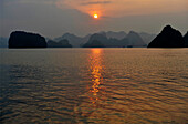 View of Halong Bay at the sunset, North Vietnam, Vietnam, South East Asia, Asia