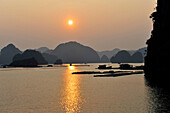 View of Halong Bay at the sunset, North Vietnam, Vietnam, South East Asia, Asia