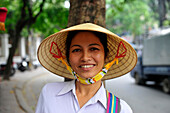 Portrait of a smiling woman, Vietnam, South East Asia, Asia