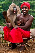 'Africa, Gabon, Mboka A Nzambe village, Bwiti ceremonies, the shaman Adumangana and his monkey ''Saint Jo'''