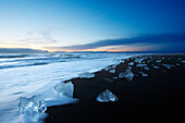 Iceland.  Southeastern Region. Jokulsarlon. Blocks of ice on the volcanic beach.