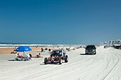 CARS DUNE BUGGIES DRIVING ON THE BEACH DAYTONA BEACH FLORIDA USA