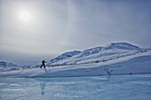 A cross-country skier in the klondike valley of tombstone territorial park, yukon canada