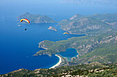 Paragliders At Mt Babadag (1950 Meters) To Oludeniz At The Turquoise Coast, Southern Turkey