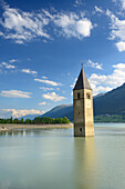 Bell tower in lake Reschensee, Ortler in the background, Reschen, lake Reschensee, Reschen Pass, Vinschgau, South Tyrol, Italy