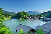 View to boat houses and the town Koenigssee at lake Koenigssee, Untersberg in background, lake Koenigssee, Berchtesgaden range, National Park Berchtesgaden, Berchtesgaden, Upper Bavaria, Bavaria, Germany