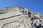 Hikers descending from Hocheck, Watzmann Hocheck, Watzmann, Berchtesgaden range, National Park Berchtesgaden, Berchtesgaden, Upper Bavaria, Bavaria, Germany