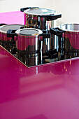 Saucepans on a ceran top, Modern pink kitchen, Kitchen Interior, Domestic life