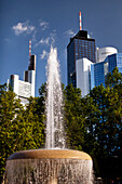 Downtown skyscrapers and the water fountain on Opernplatz, Frankfurt, Hesse, Germany