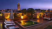 Rooftop dipping pool and the Koutoubia Mosque in the background, El Fenn, Marrakech, Morocco
