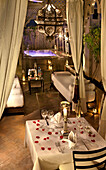 Dining on the private balcony of Zebra room, Riad Noir D'Ivoire, Marrakech, Morocco