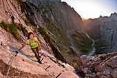 Woman ascending to Zugspitze, valley of Hoellental, Wetterstein mountain range, Upper Bavaria, Bavaria, Germany