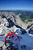 Woman ascending to Hochkalter, Berchtesgaden National Park, Berchtesgaden Alps, Upper Bavaria, Bavaria, Germany