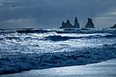 Rock formations and sea surf at Dyrholaey, ISouthern Iceland, Iceland, Europe.