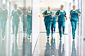 running surgeons in the operating room hallway, Onkologikoa Hospital, Oncology Institute, Case Center for prevention, diagnosis and treatment of cancer, Donostia, San Sebastian, Gipuzkoa, Basque Country, Spain