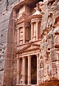 Al Khazneh The Treasury, Petra, Jordan  It is one of the most elaborate temples in the ancient Jordanian city of Petra  As with most of the other buildings in this ancient town, this structure was also carved out of a sandstone rock face  It has classical