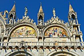 Facade with details of the Romanesque pillars & mosaics of St Mark´s Basilica, Venice