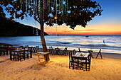 Beach Restaurant on the beach in Lima Coco Resort, sunset on the Ko Samet Island, Thailand