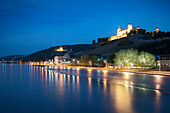 View across the Main river to Marienburg fortress and Kaeppele at night, Wuerzburg, Franconia, Bavaria, Germany
