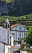 Fajazinha with church, Nossa Senhora dos Remedios, West coast, Island of Flores, Azores, Portugal