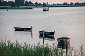 Sunset and fishing boats on the island of Ummanz, Island of Ruegen, Mecklenburg-Western Pomerania, Germany