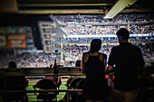 Couple at Baseball Game, Rear View Silhouette, Yankee Stadium, Bronx, New York City, USA