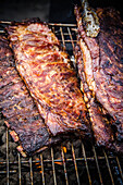Barbecue Racks of Ribs on Grill