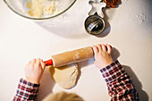Child Rolling Out Dough, High Angle View