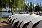 Hulls Of The 'Optimist' Boats Lined Up On The Port At The Nautical Center, The Lake In Mezieres-Ecluizelles, Eure-Et-Loir (28), France