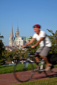 Bicycle Tourism. Cyclists In The Upper Town Near Notre-Dame Cathedral, Chartres, Eure-Et-Loir (28), Centre, France