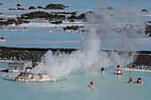 Bathers Enjoying The Hot Water Of The Blue Lagoon, Hot Springs And Silica Mud, Grindavik, Reykjanes Peninsula, Iceland