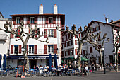 Basque Houses And Sidewalk Cafe On Louis Xiv Square In Saint-Jean-De-Luz, Basque Country, Pyrenees-Atlantiques (64), Aquitaine, France