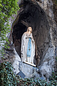 Statue Of The Virgin At The Entrance To The Cave Of Lourdes, The Sanctuary Of Lourdes, Hautes -Pyrenees (65), Midi-Pyrenees, France