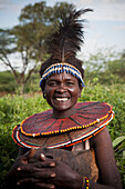 Portrait of traditionally dressed woman from Pokot tribe, Lake Baringo, Rift Valley, Kenya