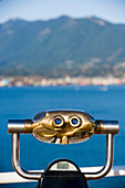 Coin operated binoculars and Vancouver waterfront in background, Vancouver, British Columbia, Canada