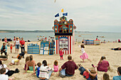 UK, England, Dorset, West Dorset, Punch and Judy on beach, Weymouth