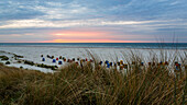 Beach and beach chairs at sunset, Juist Island, Nationalpark, North Sea, East Frisian Islands, East Frisia, Lower Saxony, Germany, Europe
