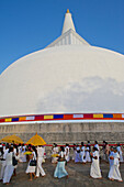 Pilgrims celebrating Poya day at Runaveli Dagoba, Anuradhapura, Cultural Triangel, Sri Lanka