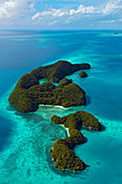 Rock islands covered with rainforest, the limestone islands have been eroded into mushroom-like formations, Palau