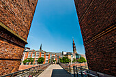 View over a bridge to church of St. Catherine, Hamburg, Germany