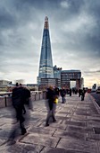 Commuters on London Bridge,London,England