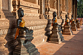 Buddhistic sculptures at the temple Wat Ho Phra Keo in Vientiane on the river Mekong, capital of Laos, Asia