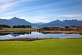 View over lake Forggensee to the Allgaeu Alps, Saeuling and Tannheim mountains, Allgaeu, Bavaria, Germany