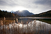 Lake Luttensee in front of the Karwendel mountains at sunrise, near Mittenwald, Bavaria, Germany