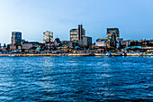 View over river Elbe to Landungsbruecken in the evening, Hamburg, Germany